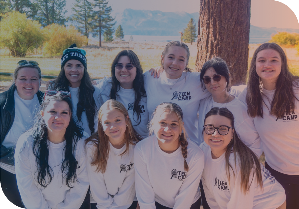 A group of teen girls smile and pose for a photo together at the Nevada Diabetes Association's Teen Camp
